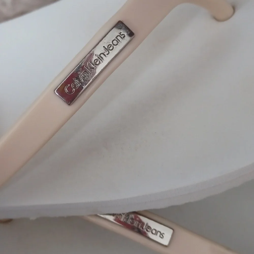 Calvin Klein flip flops